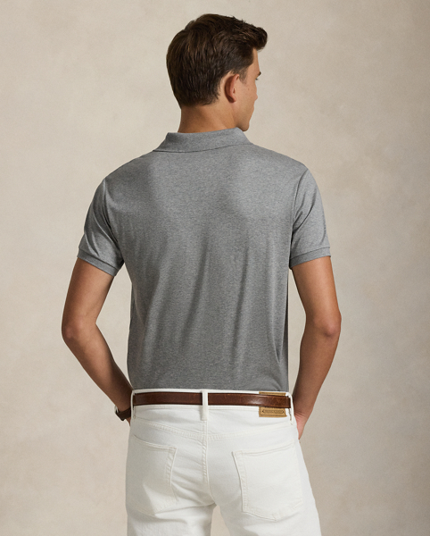 An American style standard since 1972, the Polo shirt has been imitated but never matched. Over the decades, Ralph Lauren Lauren has re-imagined his signature style in a wide array of colours and fits, yet all retain the quality and attention to detail of the iconic original. This trim version is made from luxe cotton interlock, which features an ultra-soft finish.