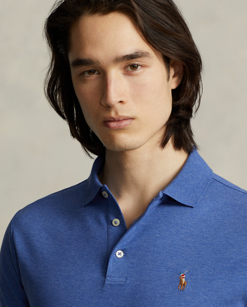 An American style standard since 1972, the Polo shirt has been imitated but never matched. Over the decades, Ralph Lauren Lauren has re-imagined his signature style in a wide array of colours and fits, yet all retain the quality and attention to detail of the iconic original. This trim version is made from luxe cotton interlock, which features an ultra-soft finish.