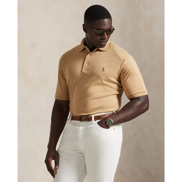An American style standard since 1972, the Polo shirt has been imitated but never matched. Over the decades, Ralph Lauren Lauren has re-imagined his signature style in a wide array of colours and fits, yet all retain the quality and attention to detail of the iconic original. This Big & Tall version is made from luxe cotton interlock featuring an ultra-soft finish.