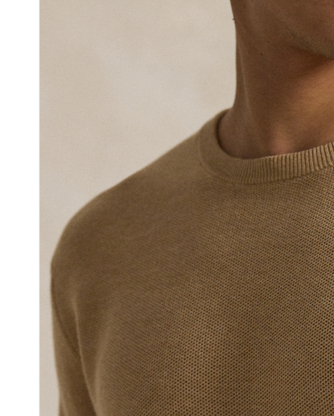 This lightweight jumper gets a tactile update with a mesh-knit construction and ultrasoft cotton.
