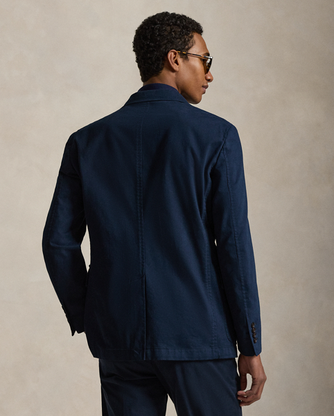 Our Polo Soft blazer puts a modern spin on classic preppy style with a natural shoulder, slightly structured chest and partial lining. This version is crafted from a custom stretch chino cloth and garment-dyed to create a relaxed look.