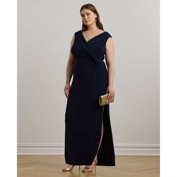 Crafted from smooth, body-hugging jersey, this column gown is designed with an elegant off-the-shoulder silhouette and a chic twist detail on the waist. A slit in the skirt creates ease of movement.
