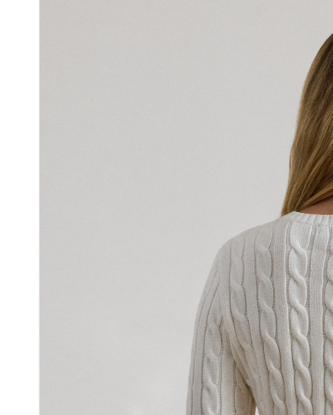 Lauren  Ralph Lauren Lauren updates the classic cable-knit jumper with signature button embellishments on the shoulder and an "LRL"-embroidered logo on the chest. Cut for a slim-fitting silhouette, it's knit from combed cotton for a soft hand.