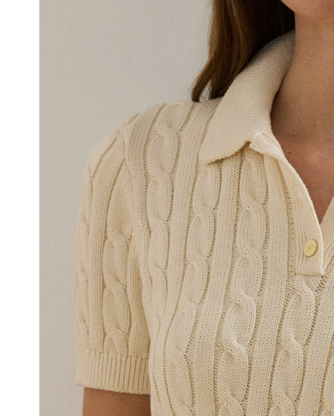 Crafted from combed cotton for a soft hand, this piece unites a timeless Polo shirt silhouette with the comfort of a cable-knit jumper. It's adorned with Lauren's signature embroidered logo and "LRL"-engraved buttons.