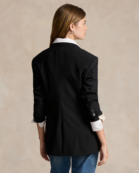 Tailored in Portugal with Italian fabrics, this blazer merges a straight fit with structured shoulders and a two-button silhouette. Its stretch wool-blend shell is fully lined with smooth, lightweight twill.