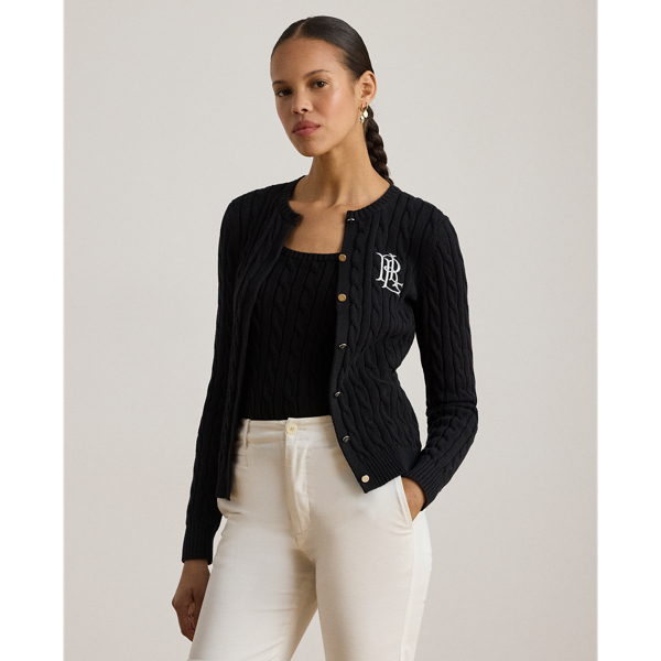 Crafted with gassed cotton for an amazingly soft feel, this classic cable-knit cardigan is accented with "LRL"-engraved buttons and Lauren's signature embroidered logo on the chest for an iconic Lauren  Ralph Lauren Lauren layering piece.