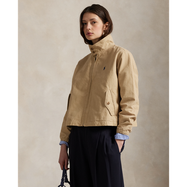 Cut for a slightly cropped fit, this fully lined cotton canvas jacket is designed with a stand collar, which can be styled up or folded down.