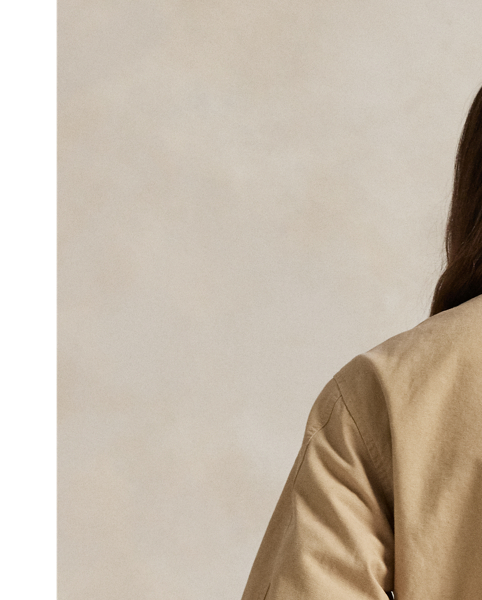 Cut for a slightly cropped fit, this fully lined cotton canvas jacket is designed with a stand collar, which can be styled up or folded down.