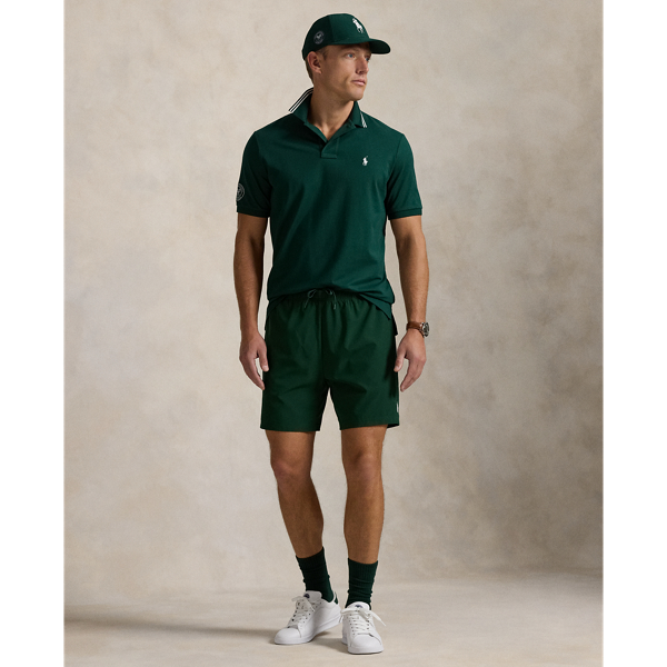 Part of our collection celebrating Wimbledon 2025, these unisex shorts are designed exclusively for the tournament's official greensperson uniform. Their lightweight stretch fabric offers moisture-wicking properties. On the interior, they are constructed with mesh-panelled compression shorts.