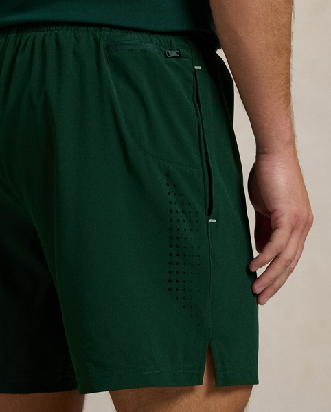 Part of our collection celebrating Wimbledon 2025, these unisex shorts are designed exclusively for the tournament's official greensperson uniform. Their lightweight stretch fabric offers moisture-wicking properties. On the interior, they are constructed with mesh-panelled compression shorts.