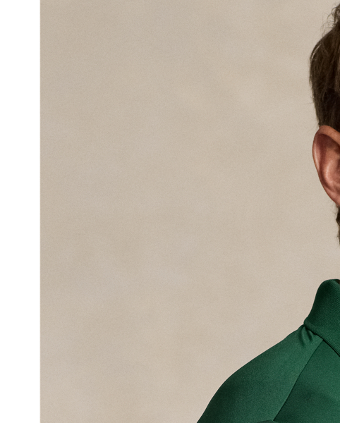 Part of our collection celebrating Wimbledon 2025, this unisex Custom Slim Fit Polo shirt was designed exclusively for the tournament's official greensperson uniform. It is made from striped stretch jersey, which wicks away moisture to help keep you cool and comfortable.