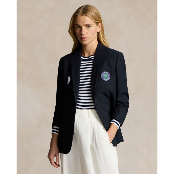 Part of our collection celebrating Wimbledon 2024, this wool blazer is designed exclusively for the tournament’s official umpire uniform. Tailored in Italy for a timeless single-breasted silhouette, it’s detailed with an embroidered Wimbledon bullion patch and  Ralph Lauren Lauren’s Big Pony.