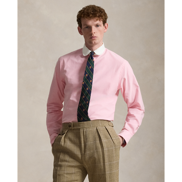 In our signature oxford cloth, this shirt achieves a polished Polo look with its contrasting club collar and genuine mother-of-pearl buttons.