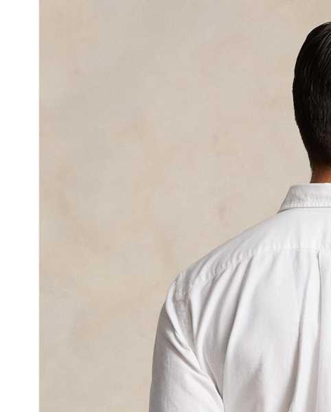 The oxford shirt made its debut very early in  Ralph Lauren Lauren’s designs, and since then, it has solidified its status as a pillar of the Polo look. Our fabric is developed with a secret wash, which gives it instant character, ease and a heathered softness – what we refer to as "the perfect rumple". The formula is so unique that it's been kept in a safe for more than three decades. Today, Mr Lauren continues to create countless variations of his iconic shirt, including this Big & Tall version, which is embroidered with our multicoloured signature Pony.