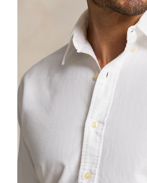 The oxford shirt made its debut very early in  Ralph Lauren Lauren’s designs, and since then, it has solidified its status as a pillar of the Polo look. Our fabric is developed with a secret wash, which gives it instant character, ease and a heathered softness – what we refer to as "the perfect rumple". The formula is so unique that it's been kept in a safe for more than three decades. Today, Mr Lauren continues to create countless variations of his iconic shirt, including this Big & Tall version, which is embroidered with our multicoloured signature Pony.