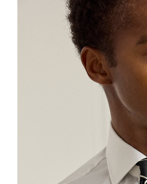 This shirt is expertly crafted in Italy with 120s-quality, two-ply cotton poplin and enhanced with genuine mother-of-pearl buttons. Each meticulous detail reflects Purple Label's commitment to superior materials and distinguished crafting.