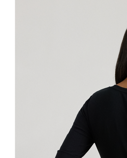 A timeless essential, this V-neck tee with elbow-length sleeves is made with breathable stretch cotton for a soft hand feel. Lauren's signature embroidered logo on the hem completes the look.