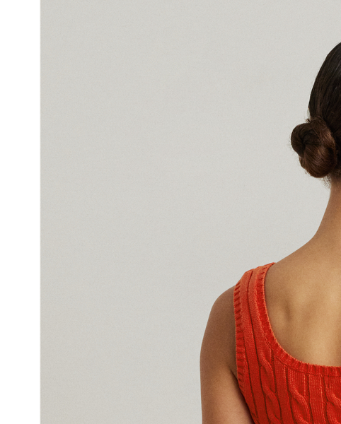 Crafted from gassed cotton for a soft feel, this cable-knit sleeveless jumper serves as an essential transitional piece into spring.