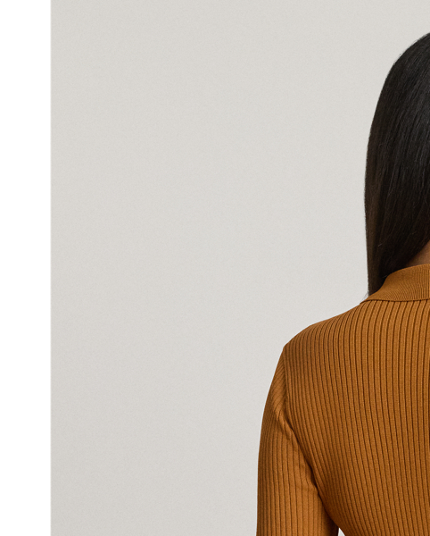 Anchored in  Ralph Lauren Lauren's refined aesthetic, this Polo cardigan features a rib-knit pattern and a slim-fitting silhouette. "Lauren  Ralph Lauren Lauren"-engraved buttons complete the look.