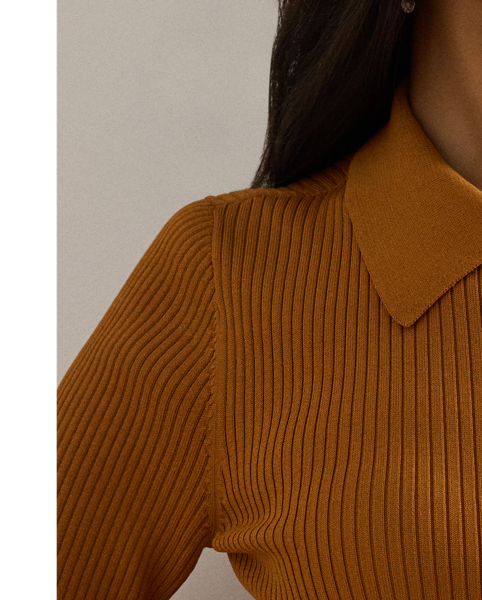 Anchored in  Ralph Lauren Lauren's refined aesthetic, this Polo cardigan features a rib-knit pattern and a slim-fitting silhouette. "Lauren  Ralph Lauren Lauren"-engraved buttons complete the look.