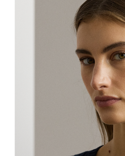 Lauren  Ralph Lauren Lauren updates the classic cable-knit jumper with signature button embellishments on the shoulder and an "LRL"-embroidered logo on the chest. Cut for a slim-fitting silhouette, it's knit from combed cotton for a soft hand.