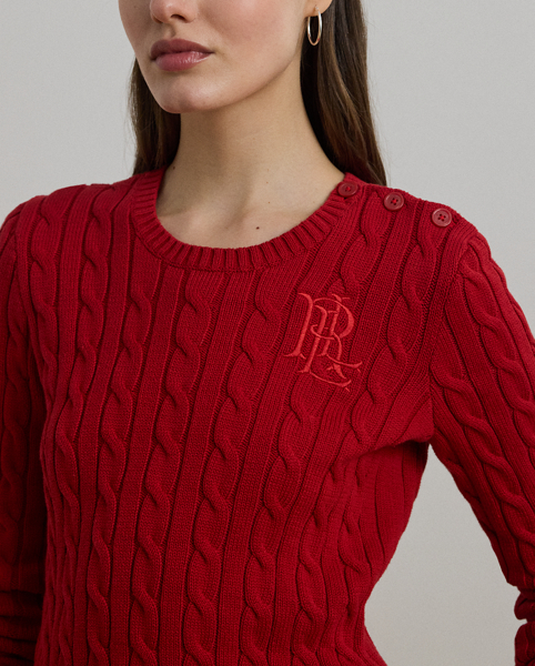 Lauren Ralph Lauren Lauren updates the classic cable-knit jumper with signature button embellishments on the shoulder and an "LRL"-embroidered logo on the chest. Cut for a slim-fitting silhouette, it's knit from combed cotton for a soft hand.