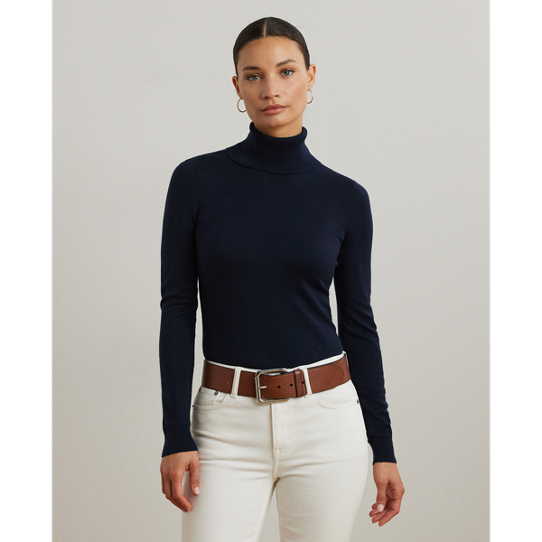 A timeless wardrobe essential, this slim-fitting roll neck jumper is realised in a luxuriously soft silk blend. A dainty “LRL”-engraved plaque on the hem adds signature style.