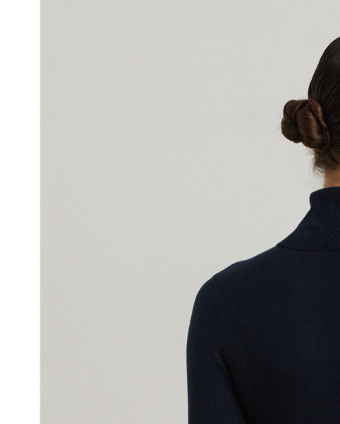 A timeless wardrobe essential, this slim-fitting roll neck jumper is realised in a luxuriously soft silk blend. A dainty “LRL”-engraved plaque on the hem adds signature style.