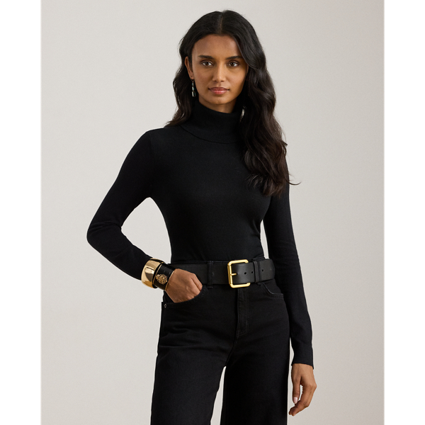 A timeless wardrobe essential, this slim-fitting roll neck jumper is realised in a luxuriously soft silk blend. A dainty “LRL”-engraved plaque on the hem adds signature style.