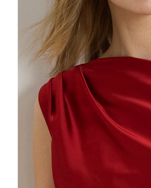 Delicate pleating enhances the graceful off-the-shoulder silhouette of this blouse, which is rendered in satin charmeuse for a beautiful sheen and a fluid drape.