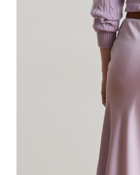 A staple piece that can be easily dressed up or down, this midi skirt is rendered in silky satin charmeuse for a fluid drape and subtle sheen.