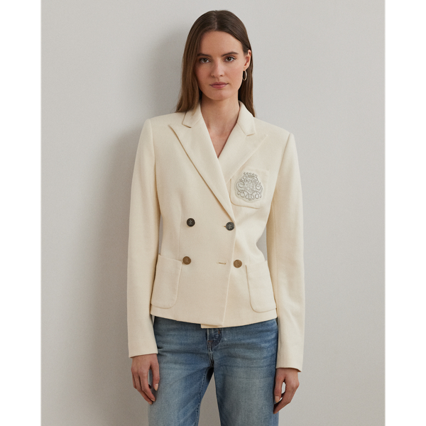 Crafted with a soft, stretch-infused cotton jacquard fabric, this sophisticated blazer is defined by a double-breasted silhouette and peak lapels. A bullion patch at the chest adds signature style, while waist darts and panel seams afford a tailored finish.
