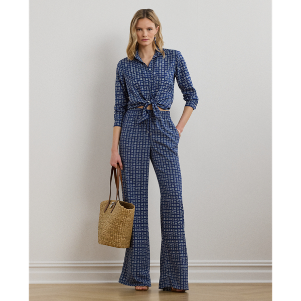Tailored from fluid crepe de chine, these trousers unite a chic wide-leg silhouette with a comfortable drawcord waist. This version is updated with the season's stylised geometric print.