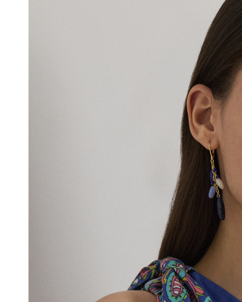 Smooth twill brings a beautiful sheen and a fluid drape to this one-shoulder blouse, which showcases the season's colourful paisley print. Self-ties form a bow on the shoulder for a feminine finishing touch.