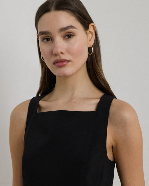 Crafted from smooth stretch crepe, this sleeveless dress merges a modern square neckline with a vintage-inspired shift silhouette. Front and back princess seams offer a flattering fit.