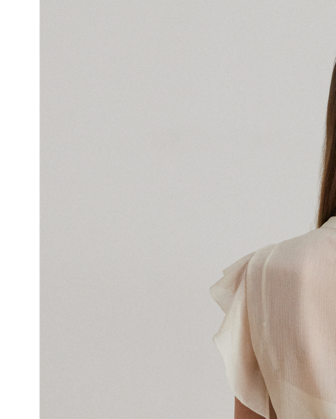 Airy, semi-sheer georgette beautifully complements this blouse's relaxed silhouette, ruffle-trimmed V-neck and flutter-sleeve design. Detailed with pintucks at the bodice, this style comes with a camisole lining for opacity.