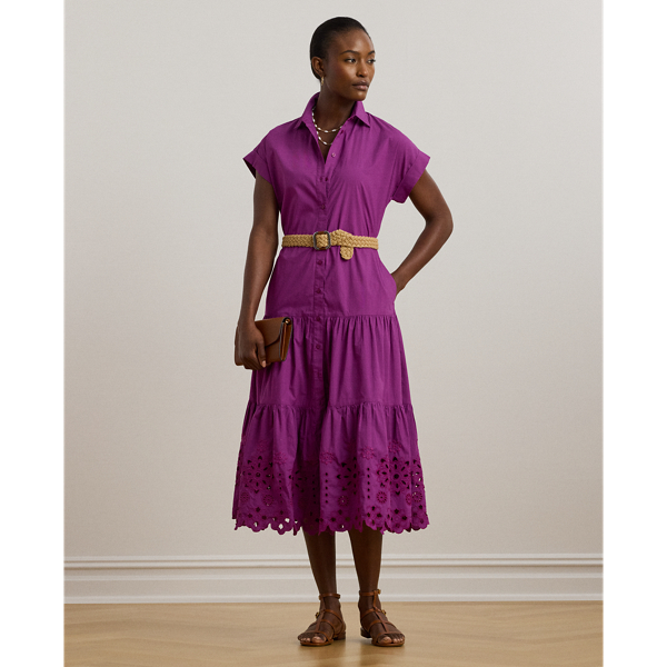 A fluid tiered skirt and eyelet embroidery add a feminine touch to this short-sleeve shirtdress, which is tailored with lightweight cotton broadcloth. Rolled cuffs and a belted waist complete the look.