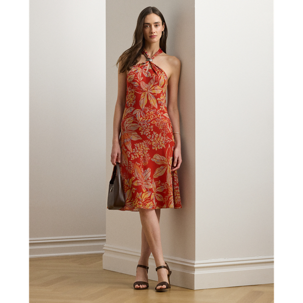 Featuring a bamboo-inspired metal embellishment at the neckline, this enchanting halter dress is crafted from crinkle georgette printed with the season's painterly floral motif.