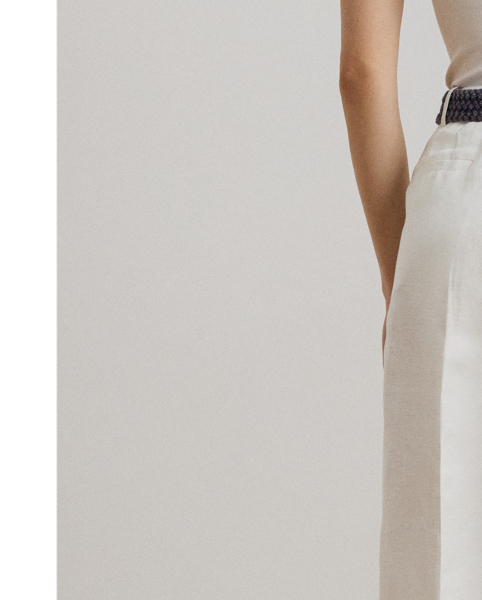 Crafted from lightweight linen-blend twill, these wide-leg trousers are detailed with waist pleats, crisp leg creases and folded cuffs for a tailored look.