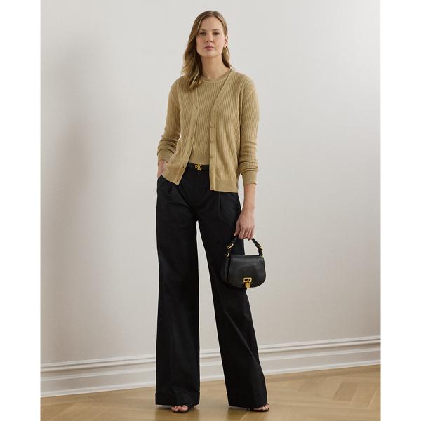 A timeless essential, these wide-leg trousers are detailed with front waist pleats, crisp creases and folded cuffs for a tailored look. This style is crafted from soft, lightweight cotton twill and has a signature horn-effect buttoned closure for a sophisticated finish.
