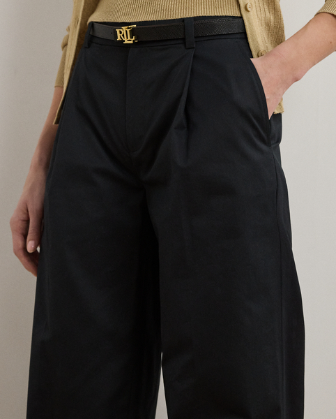 A timeless essential, these wide-leg trousers are detailed with front waist pleats, crisp creases and folded cuffs for a tailored look. This style is crafted from soft, lightweight cotton twill and has a signature horn-effect buttoned closure for a sophisticated finish.