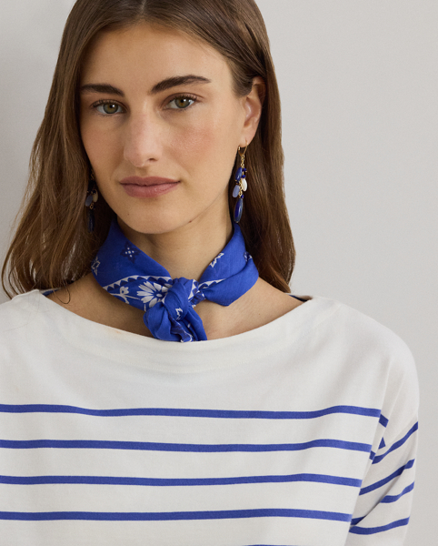 Yarn-dyed horizontal stripes punctuate the relaxed-fitting silhouette of this boatneck top, which is made with breathable cotton jersey for a soft hand feel. Lauren's signature embroidered logo on the hem completes the look.