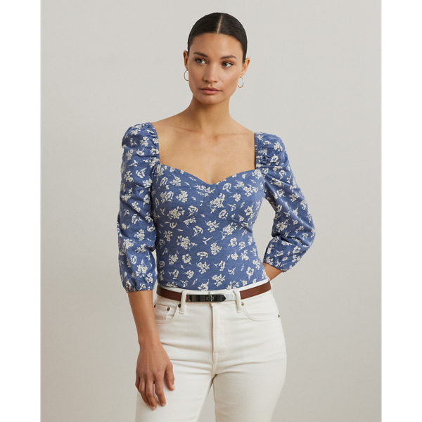 Made with soft cotton slub jersey, this puff-sleeve top exudes romance with its sweetheart neckline, two-tone floral motif and smocking at the back bodice.
