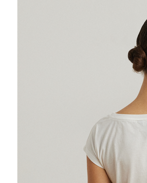 This breathable cotton-blend jersey T-shirt features a Santorini-inspired coastal landscape motif, which is rendered in the style of an ink sketch.