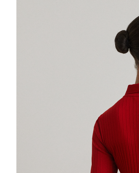 This version of Lauren  Ralph Lauren Lauren's quintessential Polo shirt features three-quarter-length sleeves and a rib-knit construction for rich dimension. "LRL"-engraved imitation shell buttons add a signature finish.