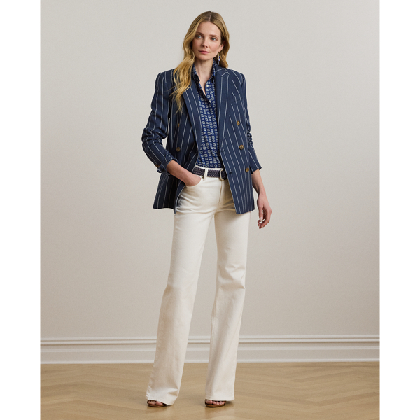 Cut for a leg-lengthening flared silhouette, these high-rise jeans are made from comfortable white-wash denim, which offers just enough stretch for a relaxed fit and feel.