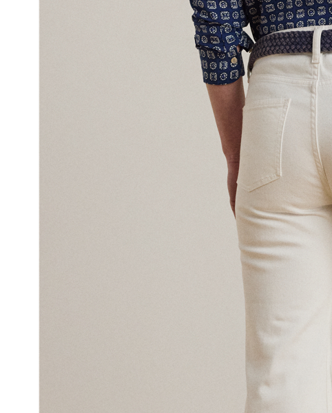 Cut for a leg-lengthening flared silhouette, these high-rise jeans are made from comfortable white-wash denim, which offers just enough stretch for a relaxed fit and feel.