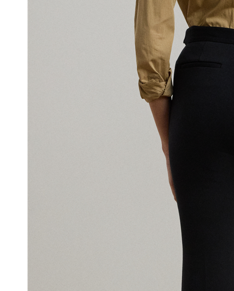 Crisp creases accentuate the leg-lengthening bootcut silhouette of these trousers, which are tailored from smooth, stretch-infused ponte. "LRL"-engraved snaps add a signature finish.