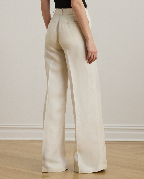 Crisp creases enhance the leg-lengthening, wide-leg silhouette of these trousers, which are tailored with linen-blend twill for a lightweight feel.