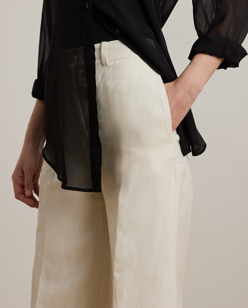 Crisp creases enhance the leg-lengthening, wide-leg silhouette of these trousers, which are tailored with linen-blend twill for a lightweight feel.